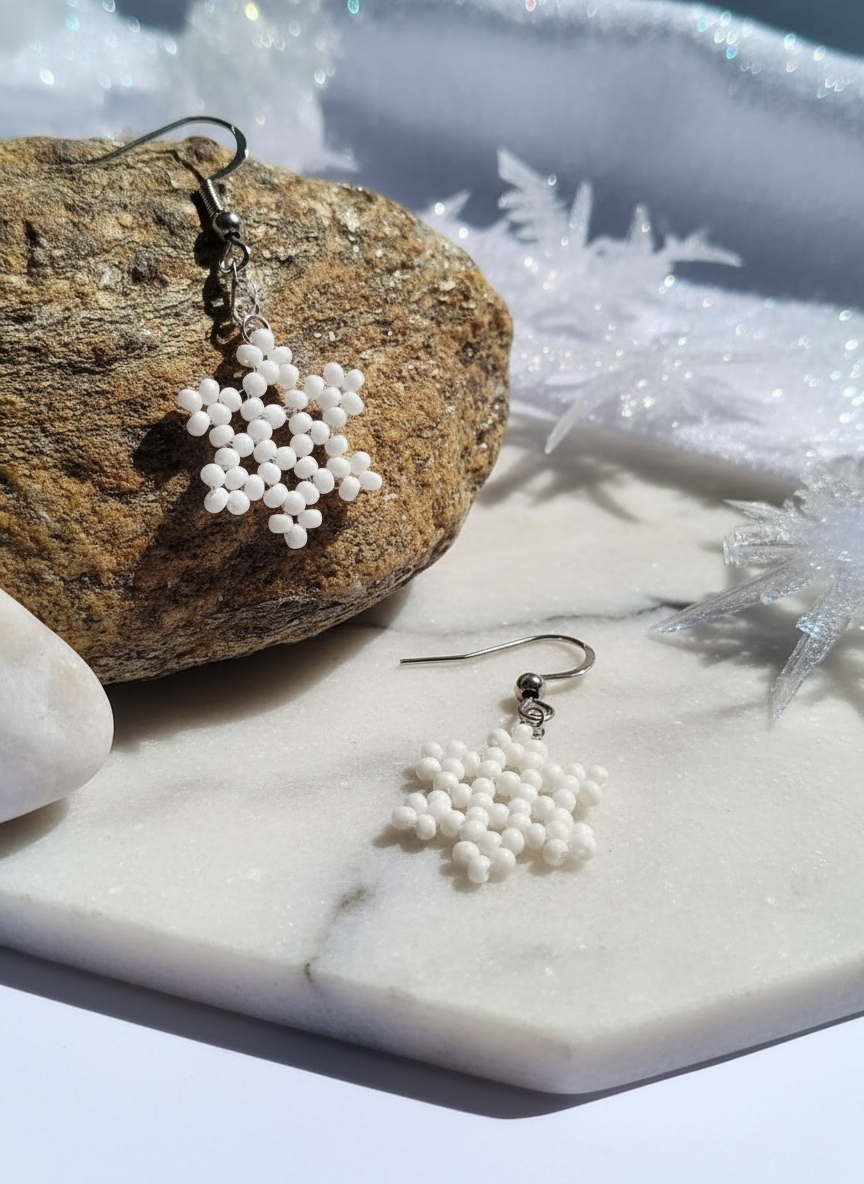 Snowflake Earrings in winter setting